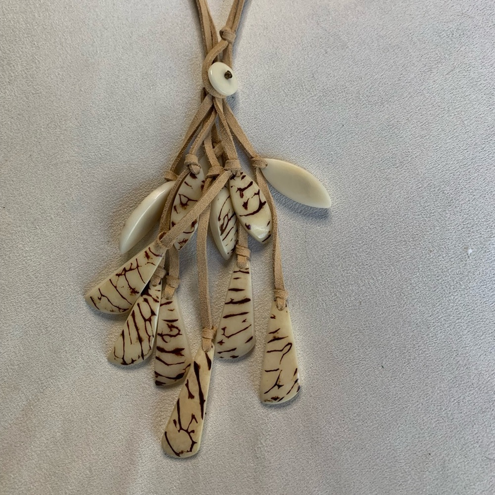 Unusual necklace. Cream cluster. Can be worn as two lengths.